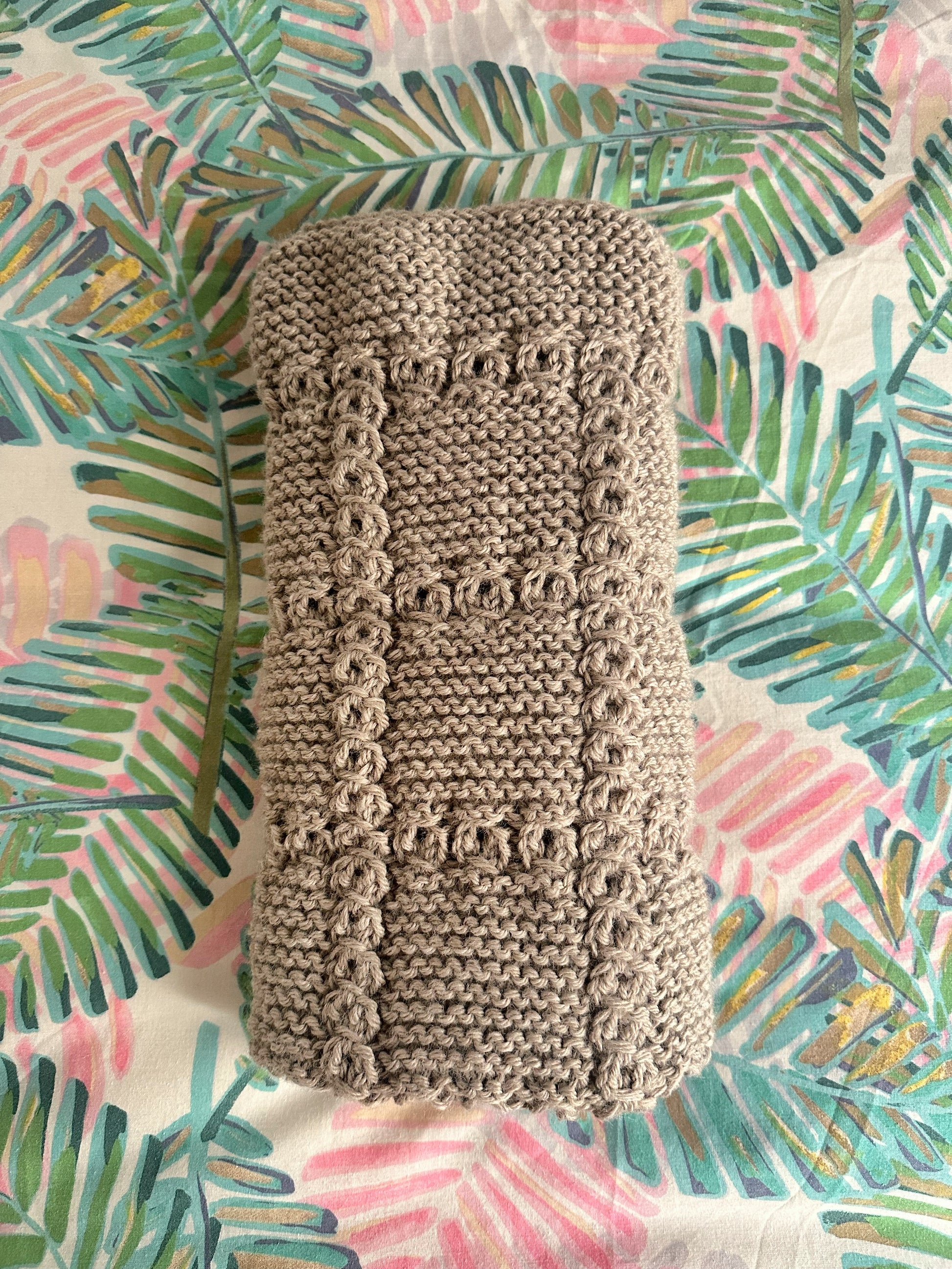 lace cable baby blanket knitting pattern folded blanket detail camel