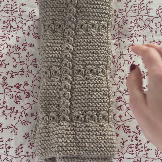 lace cable baby blanket knitting pattern video showing textured knit in movement