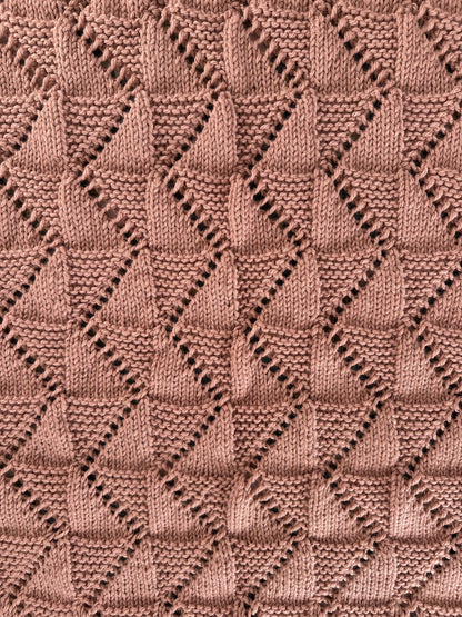 zig zag baby blanket knitting pattern knit and purl texture detail dusty pink